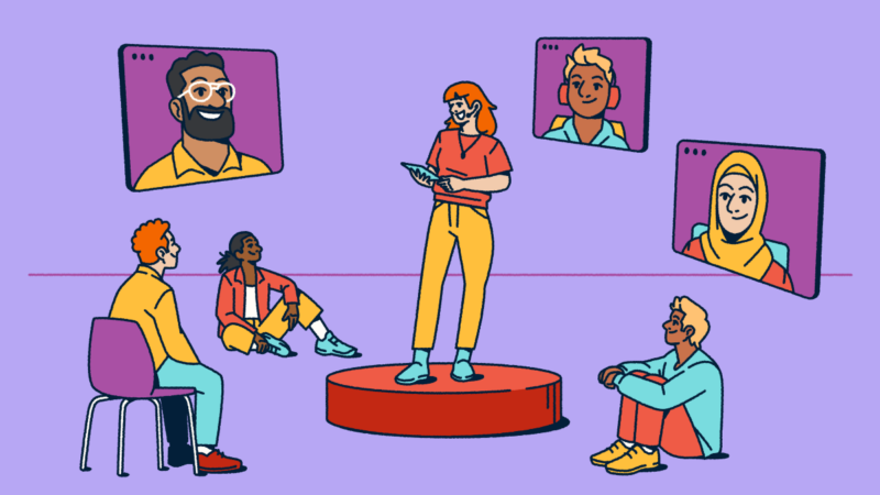 Illustration showing a hybrid meeting in action: a person presents from a circular stage while some attendees sit nearby in-person and others join remotely through video screens. The diverse group highlights how today's conferences blend virtual and in-person experiences to connect everyone regardless of location.
