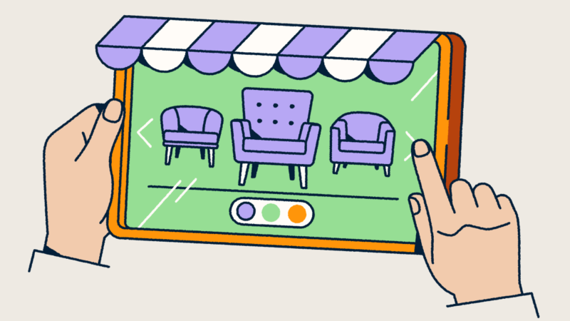 Hands holding a tablet that looks like a retail front with an awning. Furniture is displayed on the screen.