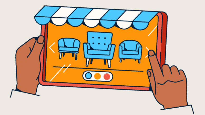 Hands holding a tablet that looks like a retail front with an awning. Furniture is displayed on the screen.